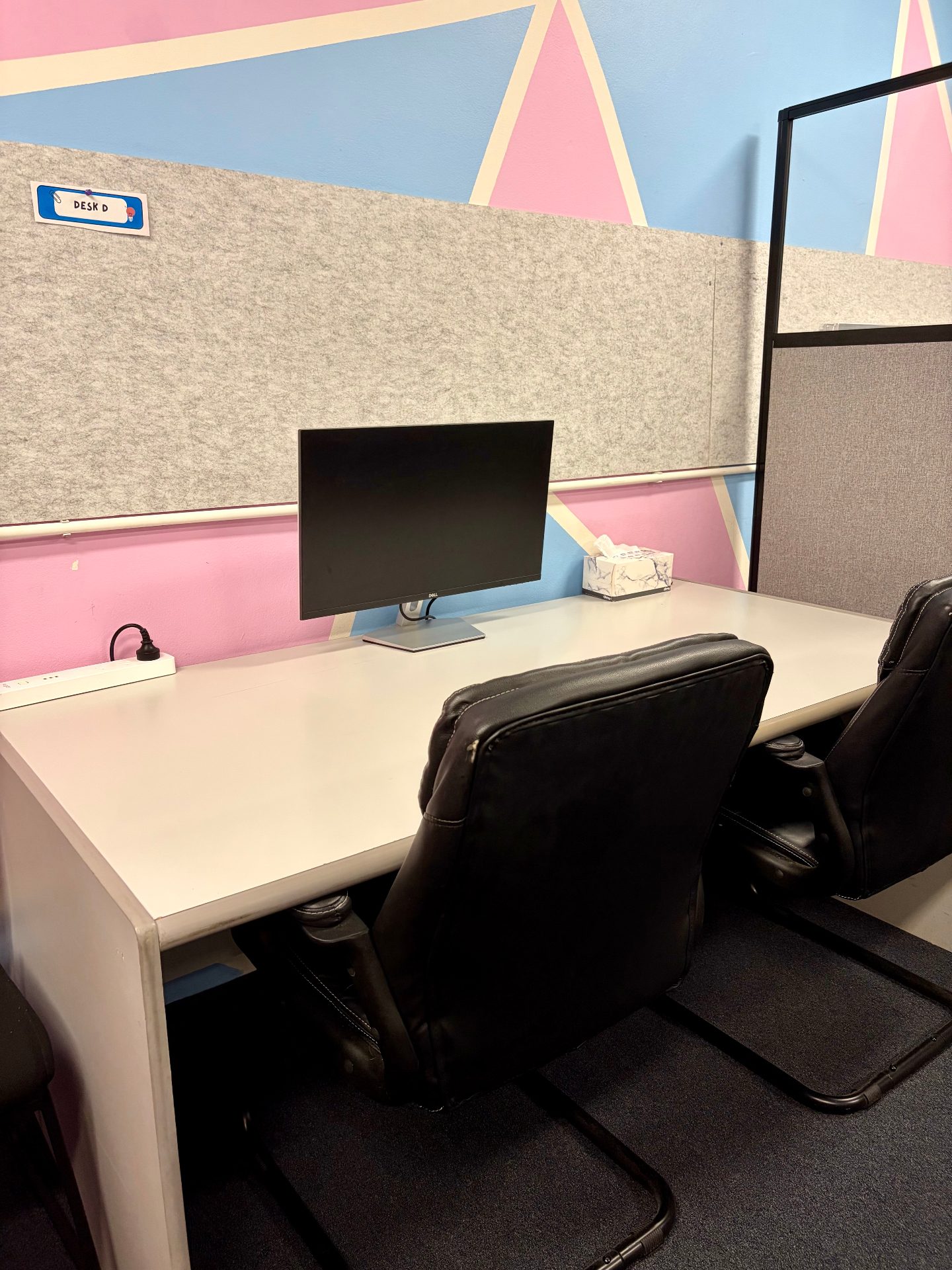 Coworking space at Northern Beaches Coworking Belrose - partitioned hot desks with monitors